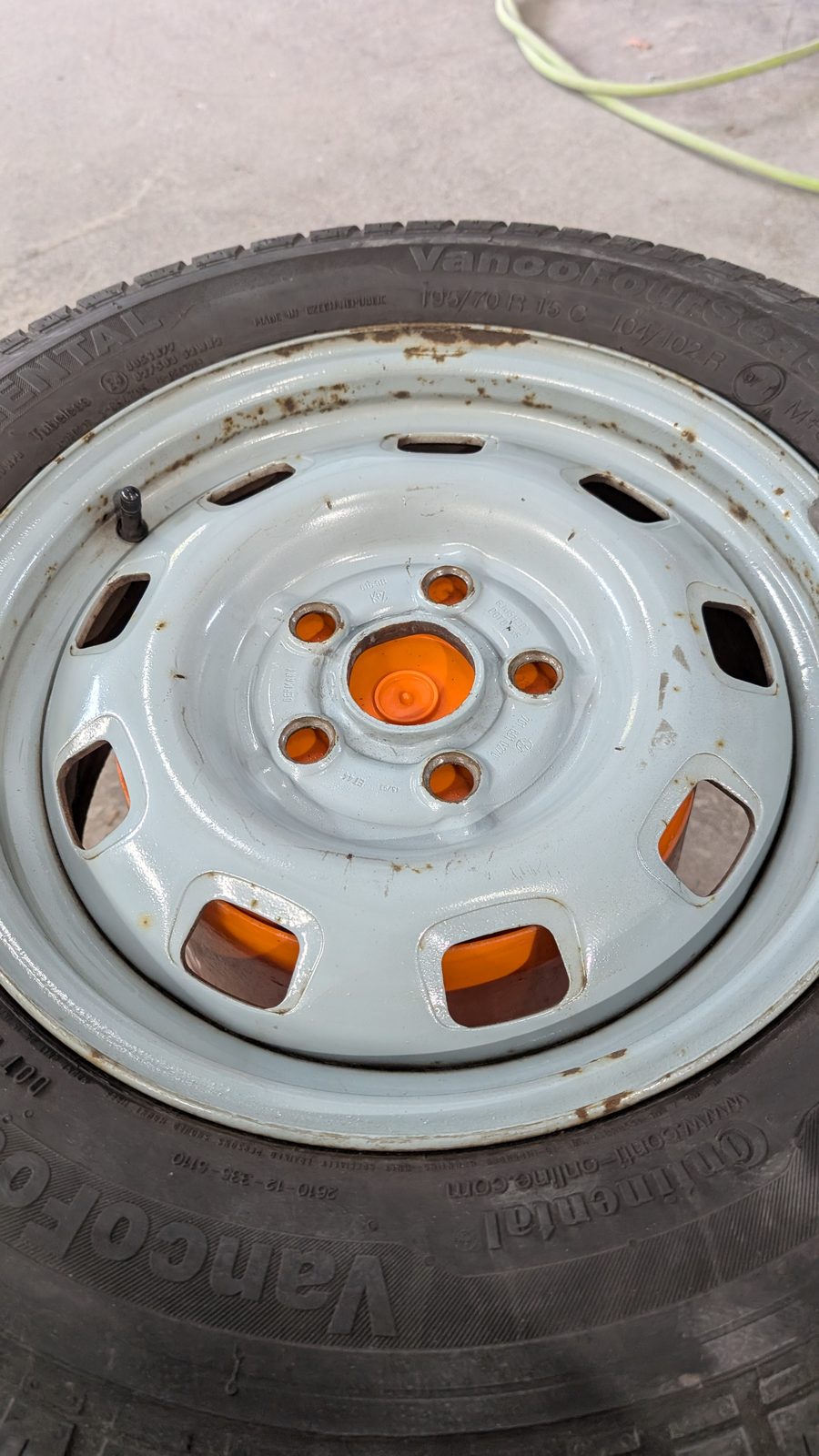 Worn, oxidized steel wheel before refinishing